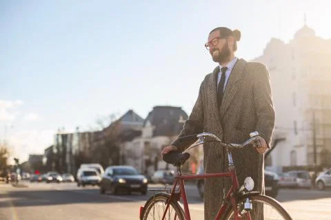 Man with bicycle Stock Photos