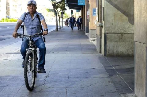Man on bicycle Stock Photos
