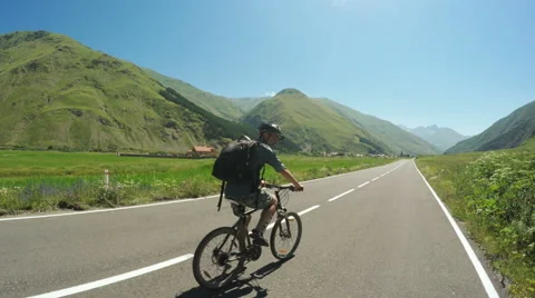 Man on bike in mountains Stock-Footage 61264480