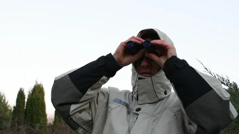 Man with binoculars  Video stock 98462107