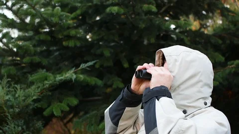 Man with binoculars  Stock Footage 98462108