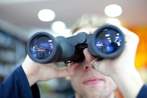 Man with binoculars Stock Photos