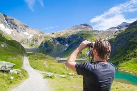 Man with binoculars Stock Photos