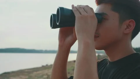 Man with binoculars.Business ambition and vision concept . Stock Footage