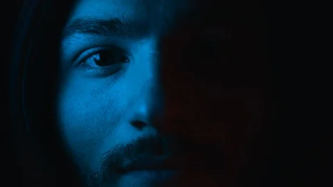 Man on Black Background.Face Expression in Colour Filter of Trendy Neon Uv Light Stock Footage 120962100