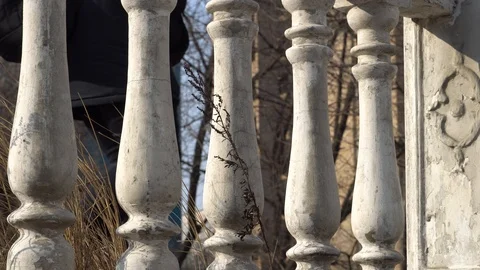 A man in black clothes with a backpack passes Stock Footage 124760433