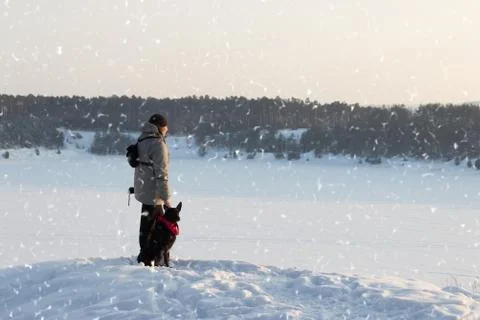 Man with black dog Stock Photos
