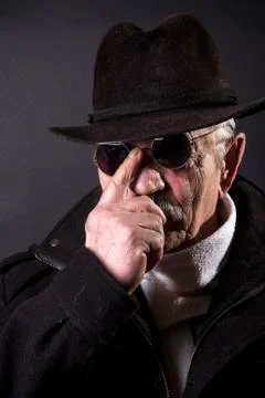 The man in black glasses corrects 写真素材