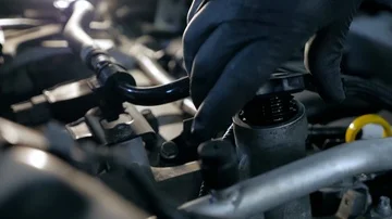 Man in black gloves close engine oil cap close up 4k Stock Footage 86069196