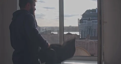 A man in black gloves opens a window. CSI Hired assassin getting ready for a Stock Footage 118646469