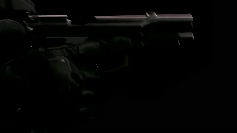Man in black gloves reloads piston and misfire Stock Footage 135764522