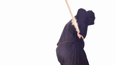 Man in black hoodie pulling rope - white screen isolated Stock Footage 104787236