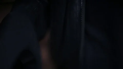 A man in a black jacket dress hat Stock Footage 70176076