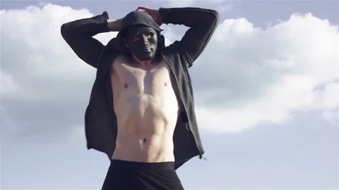 Man in black mask Stock Footage 77210133