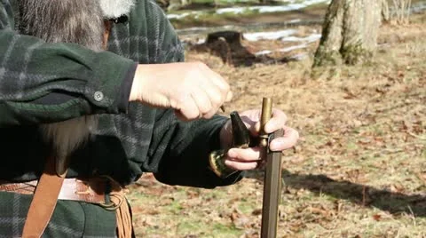Man with Black Powder Gun Filling, Step 1 Stock Footage