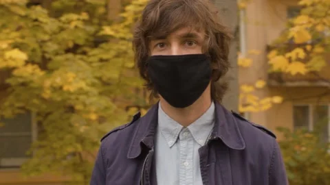 Man in black protective mask Stock Footage 141520507