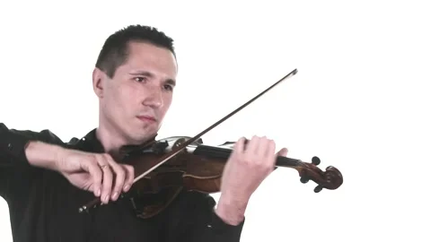 Man in black shirt performs a slow composition on a classical violin. Isolated Stock Footage 134495276
