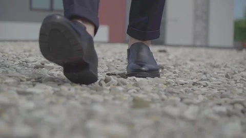 Man in black shoes stepping forward Stock-Footage 146472094
