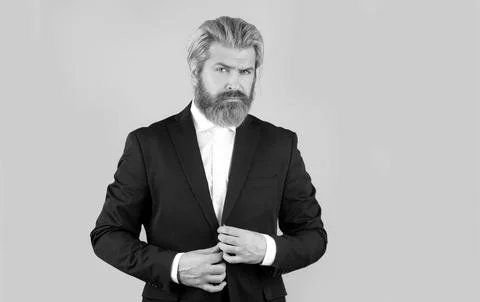 Man in black suit. Luxury business fashion. Classic suits vogue. Male in classic Stock Photos