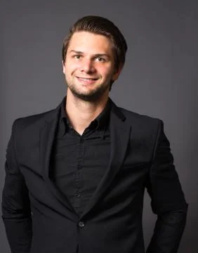 Man in black suit Stock Photos