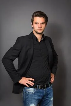 Man in black suit Stock Photos