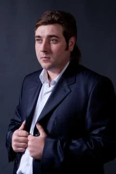 Man in a black suit Stock Photos