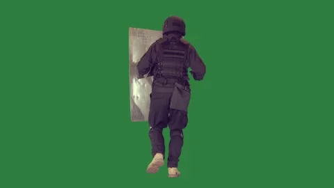 A man in black suit is walking isolated on green screen background Stock Footage 336969385