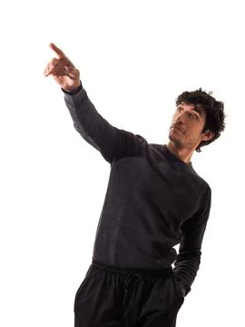 A Man in a Black Sweater Pointing at Something Stock Photos