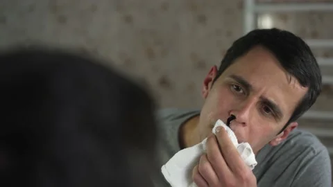 Man is bleeding from the nose Stock Footage 155196146