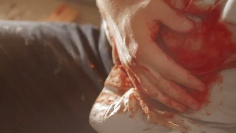 Man with a bleeding wound close-up Stock Footage 71545377