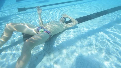 Man blowing bubbles underwater Stock Footage 97021081