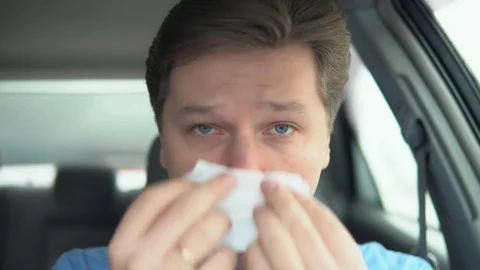 The man blows his nose Stock Footage 81831134