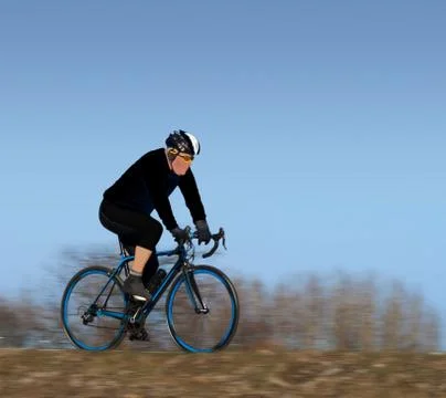 Man on blue bicycle Stock Illustration