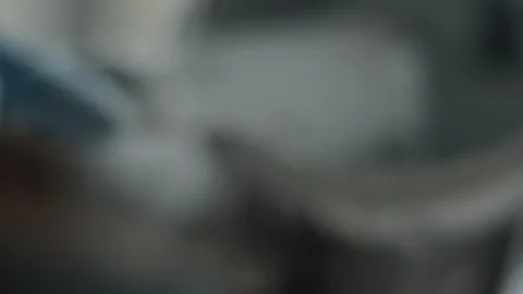 A man in blue gloves is preparing to paint Stock Footage 271561480