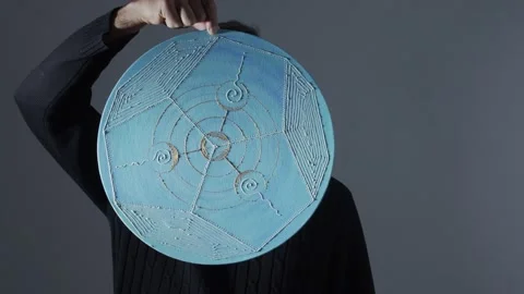 A man with a blue pattern instead of a face steps out of the darkness into the l Stock Footage 232998542