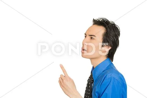 Man in blue shirt pointing finger up he solved problem Stock Photos