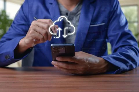 Man in Blue Suit Using Smartphone with Cloud Upload Icon on Screen Stock Photos