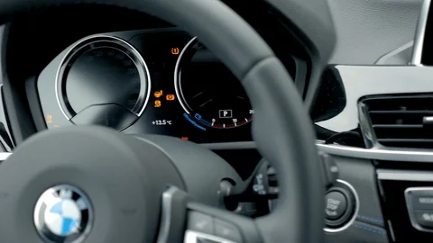Man in BMW x2 2018 start engine button. car dashboard Stock Footage 96152286