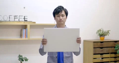 Man with board indoors Stock Footage 161859200
