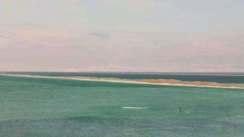 Man on the Board For Stand up Paddling at Dead Sea Stock Footage 74422324