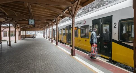 Man boarding the train Stock Photos