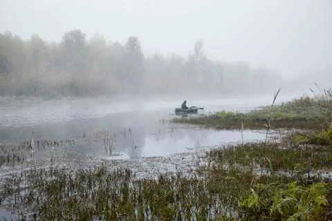 Man in a boat 스톡 사진