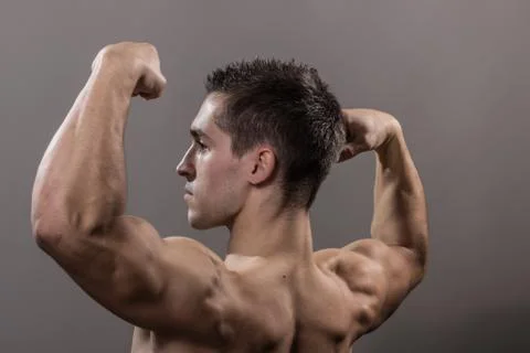 Man bodybuilder back side view close up Stock Photos