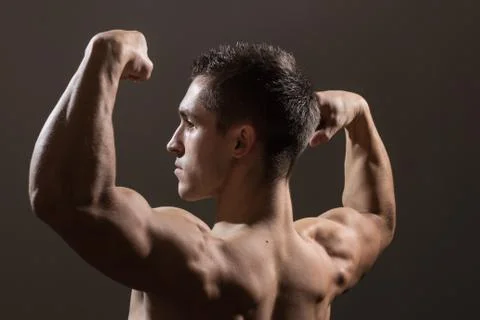 Man bodybuilder back side view close up Stock Photos