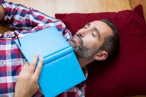Man with book Stock Photos