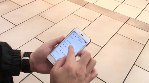 Man Booking Express Bus Ticket Online Using Smartphone App Stock Footage 346382035