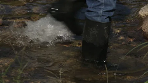 Man Boot crossing the river / creek in Rio de Janeiro Brazil 스톡 동영상 42165341