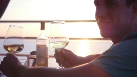 A man is bored in a cafe, holds two cradles in his hands and checks himself with Video stock 79782140