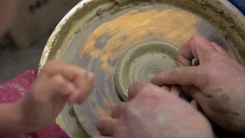 Man with both hands is working on earthenware Stock Footage 82402942