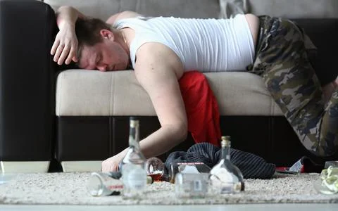 Man with bottle of alcoholic drinks Stock Photos